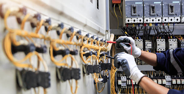Professional Electrician technician working in Garland, UT